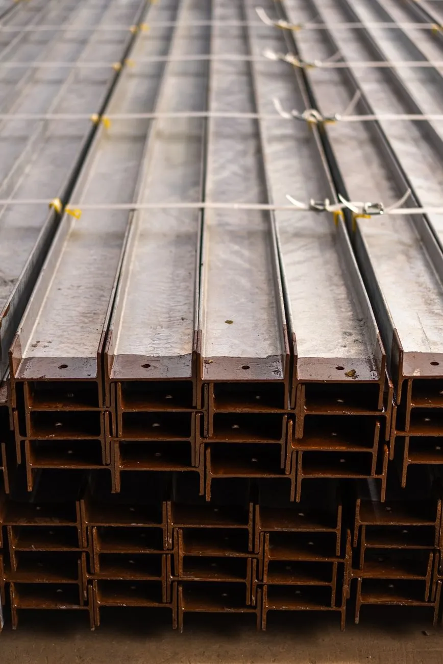 Stacked universal beams strapped together in the stockyard